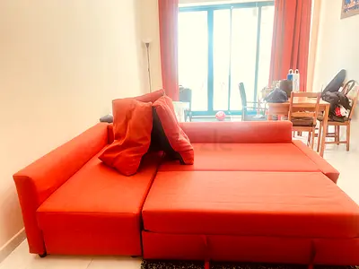 IKEA Orange L-shaped Sofa Bed - Convertible Sectional, Good Condition