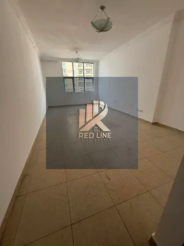 Two-bedroom apartment with a living room in the Al-Taawun area – free parking and flexible payments
