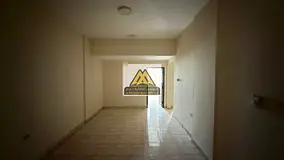 Spacious 2-bedroom apartment with living room on the first row of Ajman Corniche,featuring a direct