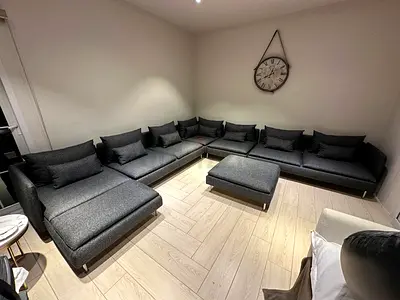 Large Modular Grey Fabric Corner Sofa with Ottoman