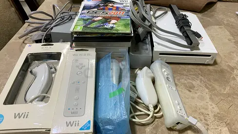 Nintendo Wii bundle with controllers and games - good working condition