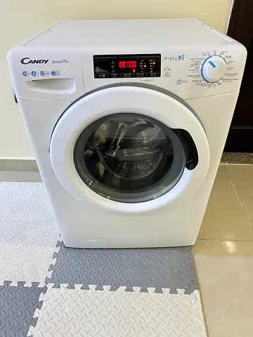 Candy front-load washing machine 10kg. Door is not opening, electronic issues. 200 AED is last price