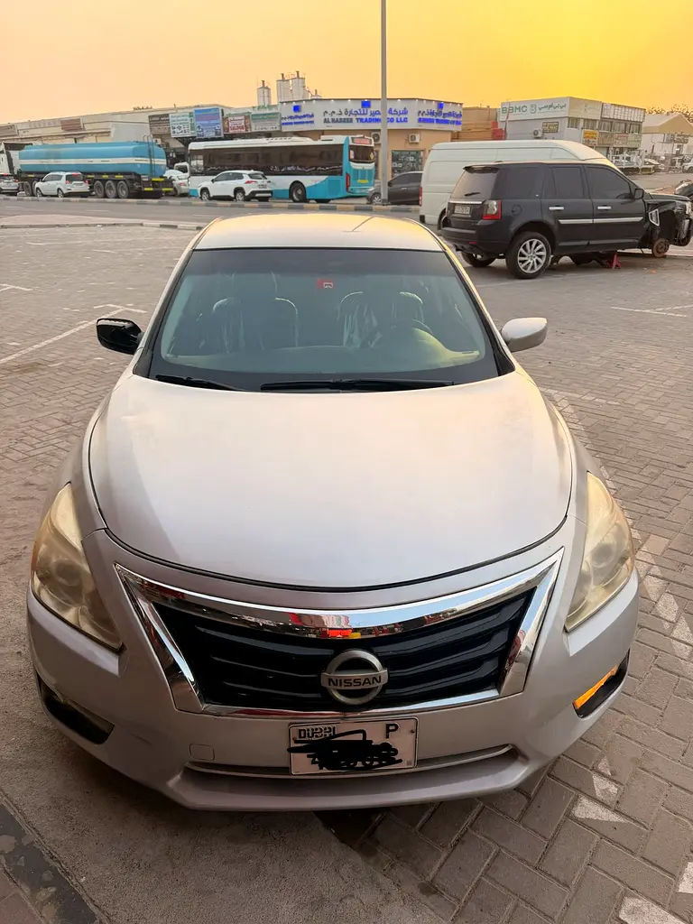 Nissan Altima 2015 — photo 1 of 7