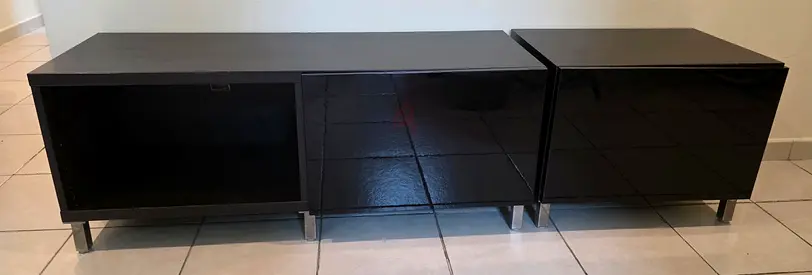 Low glossy black entertainment TV unit with storage space. W180cm X H50cm X L40cm