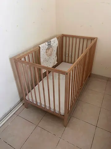 SNIGLAR Solid Wood Baby Crib bed - Light Natural Finish, Good Condition + Mattress 250 AED