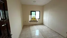 A spacious 2-bedroom apartment with a living room for annual rent in Al Nakheel 1 – Ajman, located