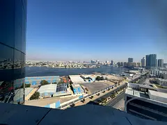 For annual rent in Ajman: Two bedrooms and a living room in Orient Towers, with a balcony and a stun