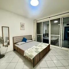 Private fully furnished room for rent for executive lady on corniche with balcony on Corniche