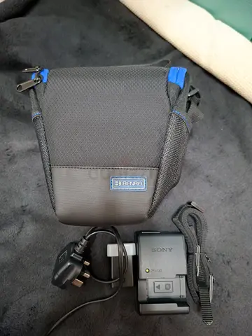 Small Benro Camera Bag with Sony Battery Charger and Strap
