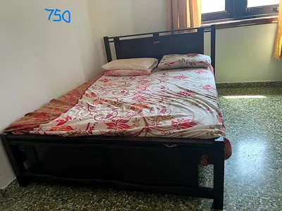 Solid wood double bed frame with mattress included - good condition