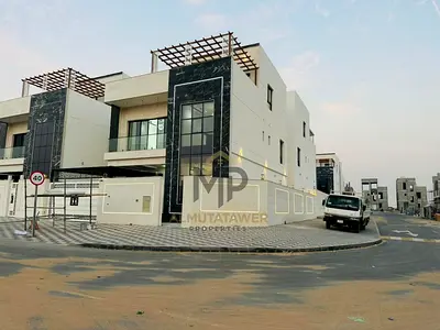 Corner Villa| ajman|al helio2|7 master rooms, majlis, hall, roof|freehold|price includes registration fees and central A\C|negotiable.
