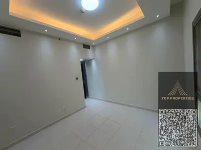 One-bedroom apartment for annual rent in Paradise Lakes Towers – with private parking. Features include a comfortable bedroom, a spacious and function
