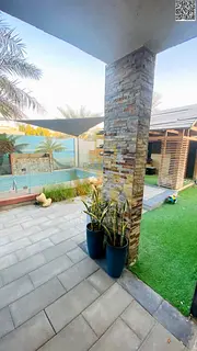 Two-story villa with a rooftop terrace, internal yard, and swimming pool, price includes electricit
