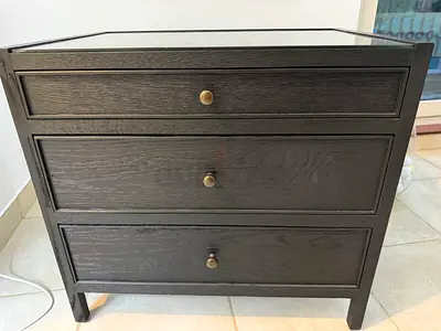 2 black wooden bedside tables