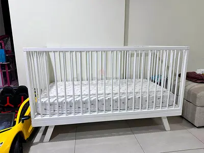 Home Center White Wooden Baby Crib 70cm x 140cm with Mattress and Sheets - Good Condition