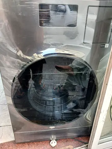 Brand new front-load washing machine - unused, stainless finish