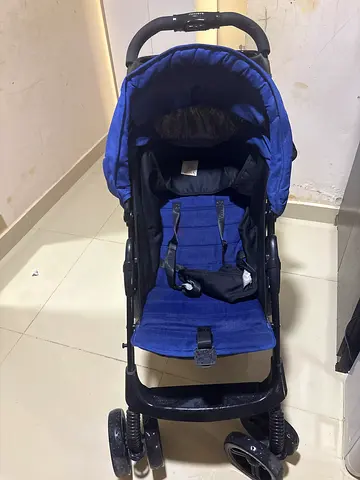 Blue baby stroller / pram in good used condition