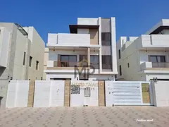 Villa for sale at ajman|Al Bahia area|5 master rooms,majlis, 2 halls, maid room, roof|freehold | 0 r
