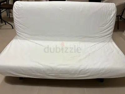 White Convertible Sofa Bed — Compact Futon in Good Condition
