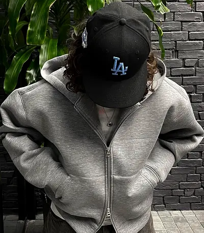 Grey zip-up hoodie, unisex, good condition.