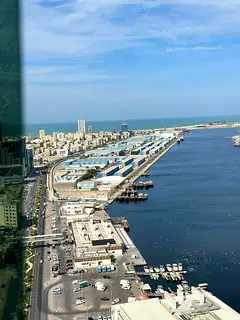 Apartment for sale in Al Waha Towers, consisting of 3 rooms, a living room, and 4 bathrooms, with a