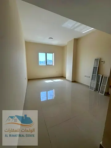 For annual rent: One bedroom, living room, bathroom, and balcony in Al Nuaimiya 2, behind Kuwait St