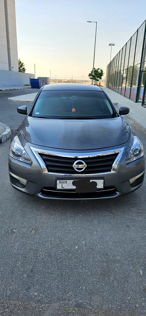 Nissan Altima 2014 — photo 1 of 7