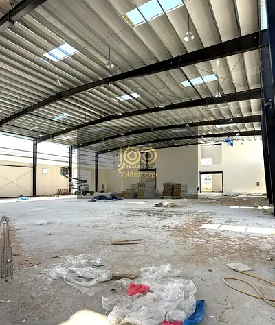 For sale: A distinctive complex consisting of two warehouses, a mezzanine, 12 offices, and 18 staff rooms.