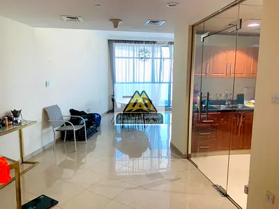 Apartment for sale in Ajman Corniche Residence with a full sea view. The property features a spacious layout and high-quality finishing in a prime loc