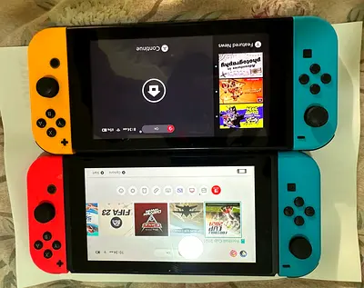 Nintendo Switch console Two pieces  with neon Joy‑Con pair (working condition)
