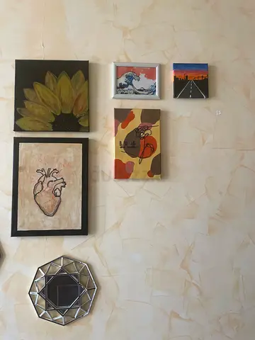 Collection of Small Framed Artworks and Decorative Mirror