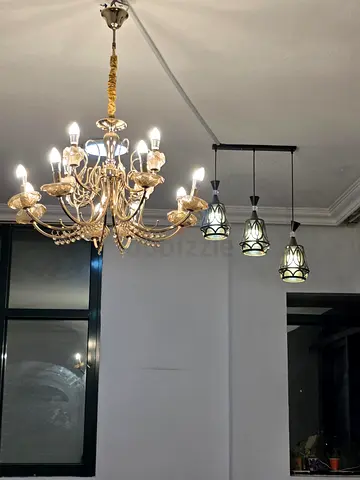 Classic crystal chandelier with three pendant lights - set of two fixtures and tv cabinet