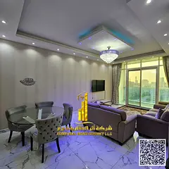 Furnished two-bedroom apartment with a living room for rent in Ajman, Al Rashidiya 1, Oasis Towers.