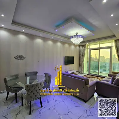 Furnished two-bedroom apartment with a living room for rent in Ajman, Al Rashidiya 1, Oasis Towers. Clean and tidy furnishings. Includes all bills