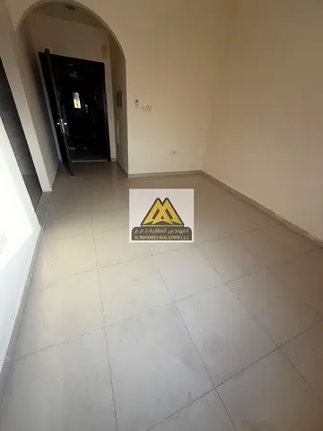 A distinctive studio apartment for annual rent in Al Nuaimiya 1, Ajman, with a spacious area and an excellent location close to all services.