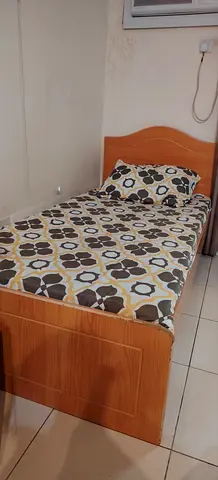 Single wooden bed with mattress and bedding - good condition