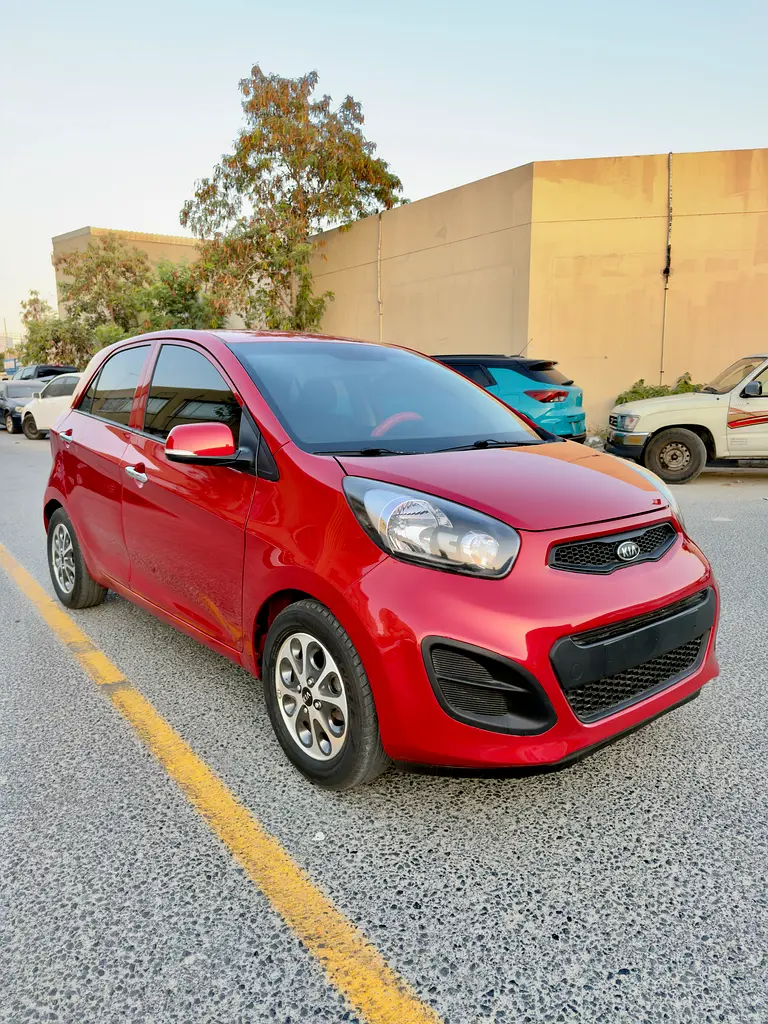 Kia Morning 2013 — photo 1 of 18