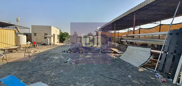 INDUSTRIAL LAND FOR RENT IN AL SAJAA INDUSTRIAL AREA | 10,000 SQFT | 25 KW ELECTRICITY | OFFICE + KITCHEN + WASHROOM