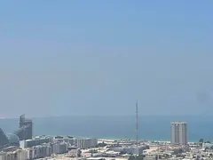 Balcony with open and sea view | Free air conditioning, parking, gym, and swimming pool | Spacious l