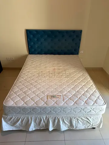 Queen size box bed with mattress and head board