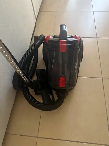 Compact canister vacuum cleaner in good working condition I give it