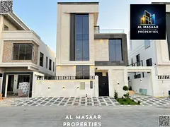 Modern villa in Al Yasmeen, two floors and a roof, in a prime location, freehold ownership for all n