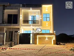 Two-story villa with a rooftop terrace, available for immediate occupancy in one of Ajman's most