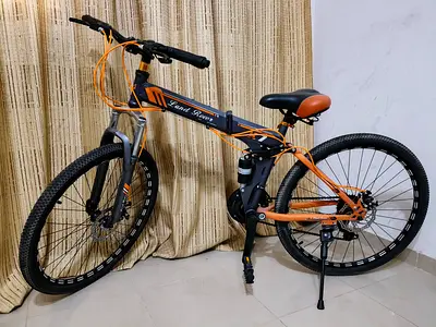 Lightly used folding mountain bike — 21-speed, disc brakes