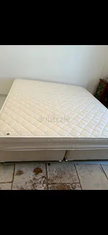 Guest bedroom KING KOIL firmmattress + base. Always used with mattress protector.  Excellent con