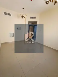 For annual rent: a spacious one-bedroom apartment in Al Qulaya, Sharjah. Large area with an open vie
