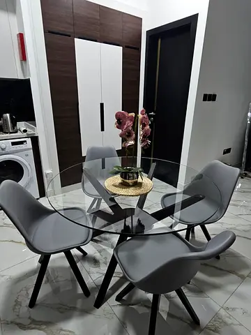 Glass Top Dining Table with 4 Grey Chairs - Modern Set