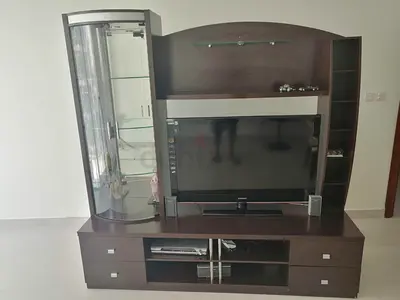 Dark Wood Entertainment Unit with Curved Glass Display