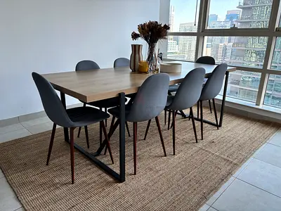 8-seater dining table with grey chairs