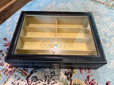 Storage boxes for watches and glasses